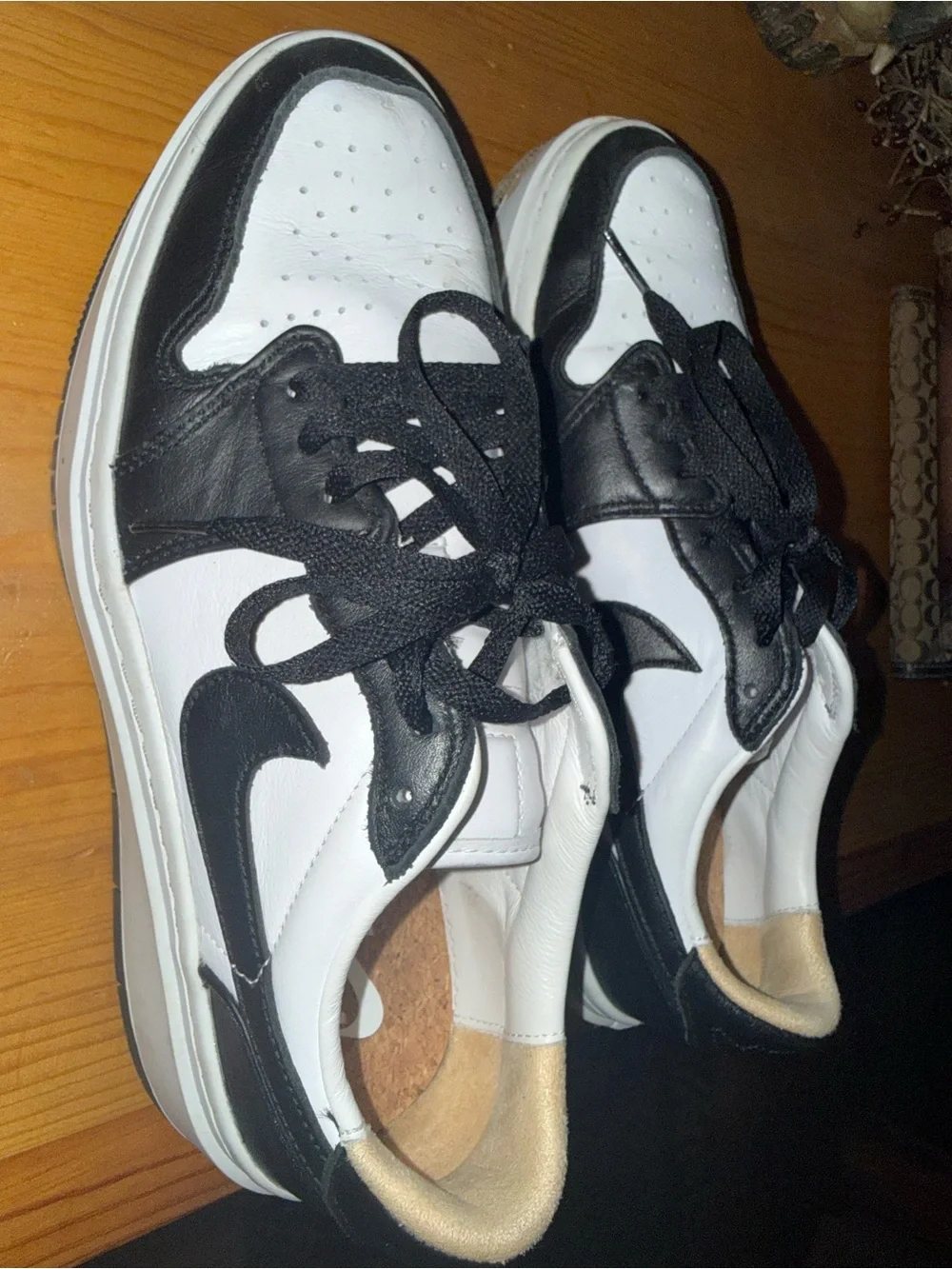Nike Women’s Black and White Low-Top Sneakers with Swoosh